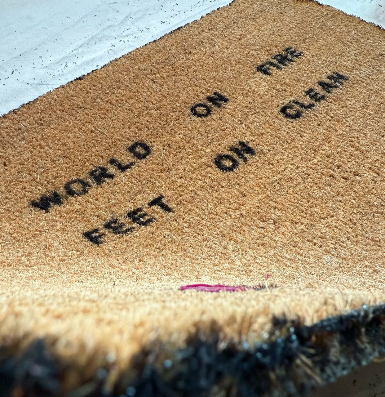WORLD ON FIRE FEET ON CLEAN - Doormat